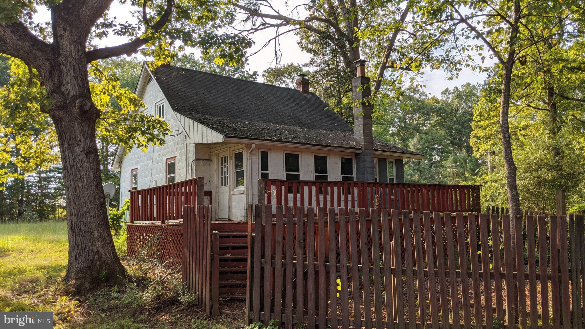 Rear deck and small fenced yard