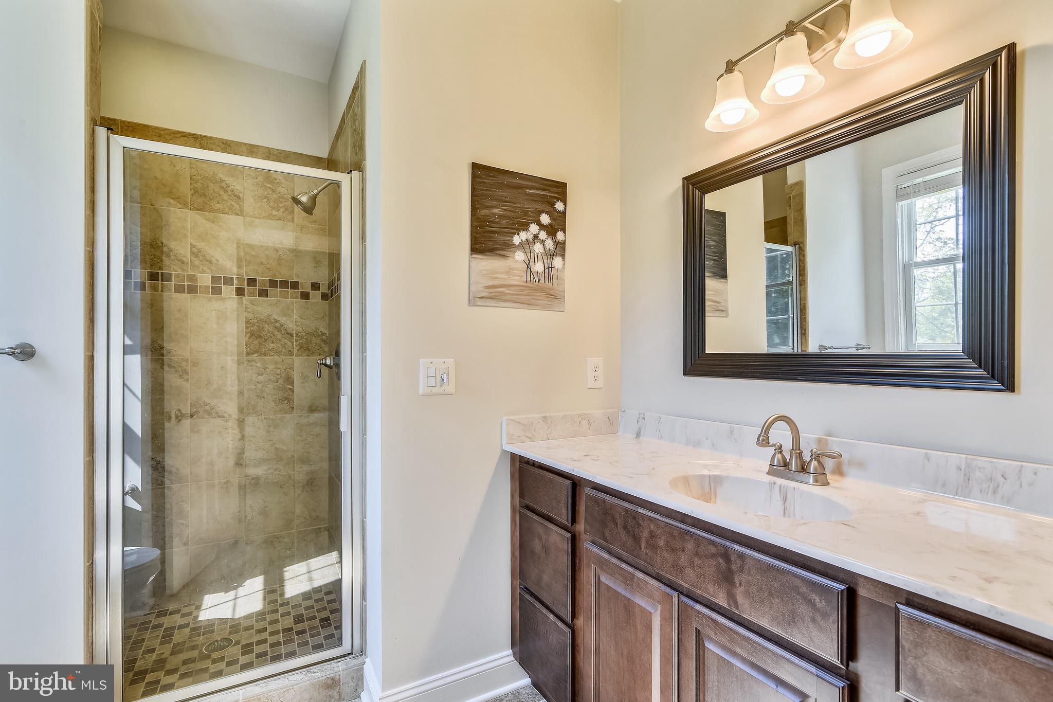 15111 Black Hill Road Rixeyville, VA 22737 - Photo 26 of 58 Primary Bath with Ceramic surround and flooring