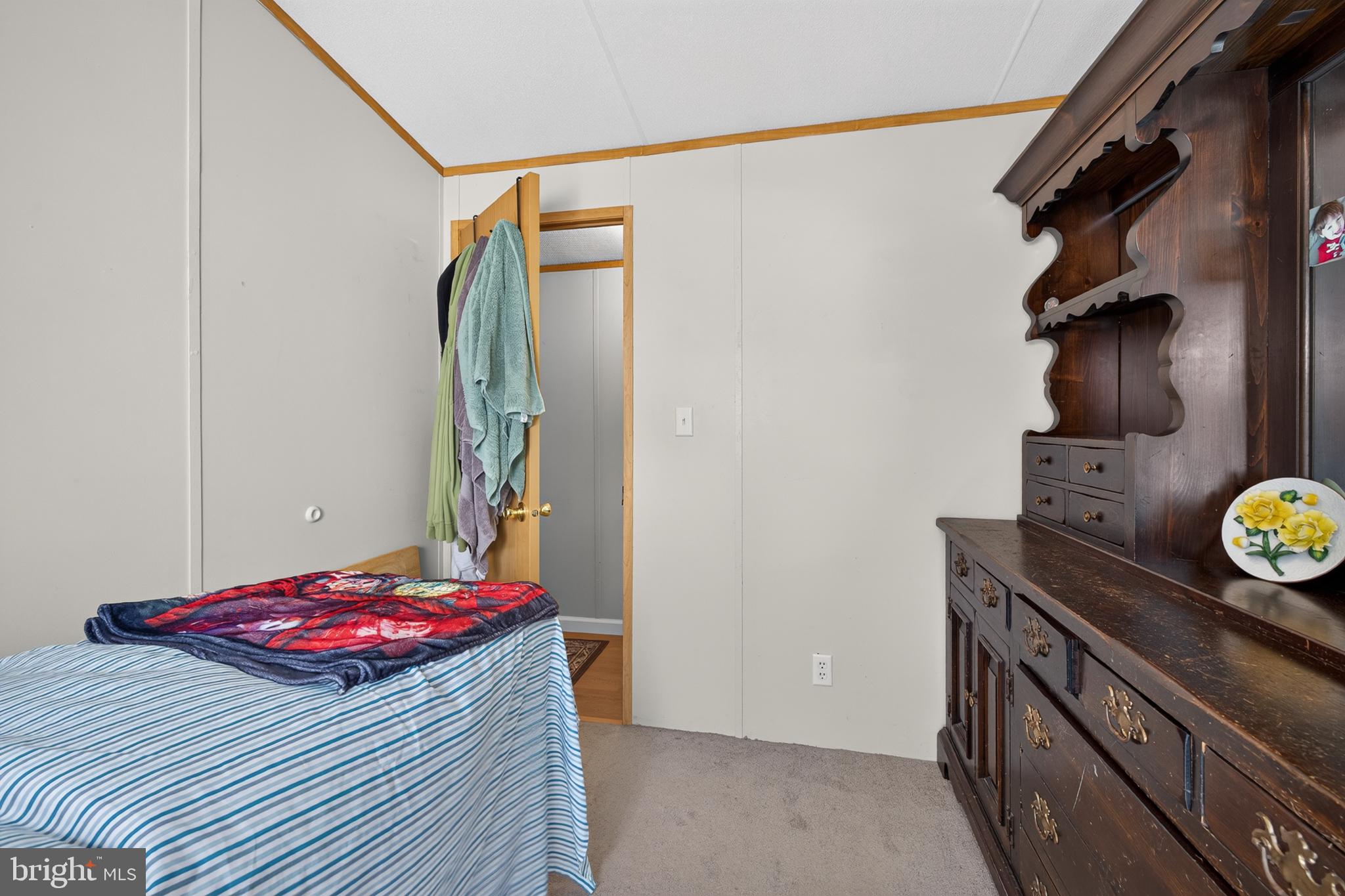 8 West Reybold Drive, Unit 8 Middletown, DE 19709 - Photo 20 of 30 Cozy room with warm wooden accents.