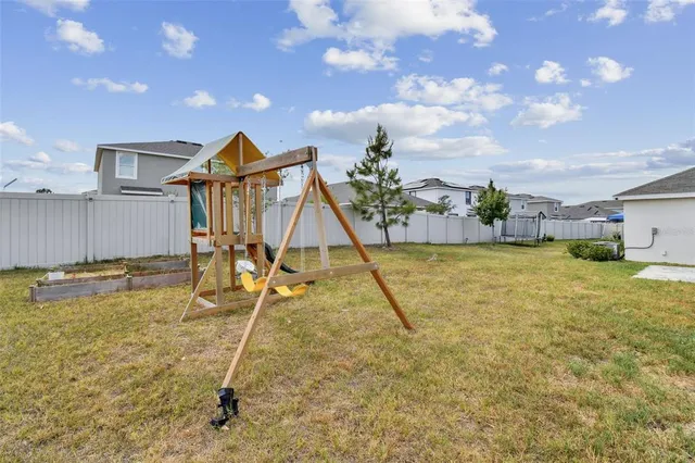 a house view with a swimming pool
