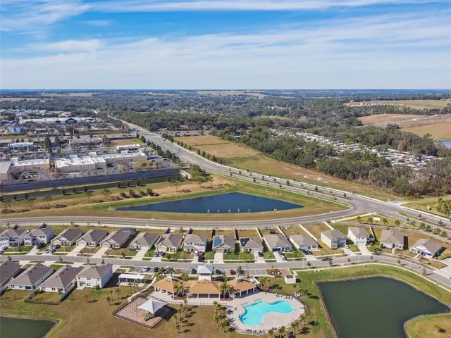 an aerial view of a city with lots of residential buildings
