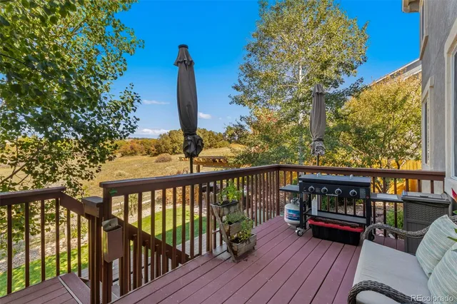 a view of a two chairs in the roof deck