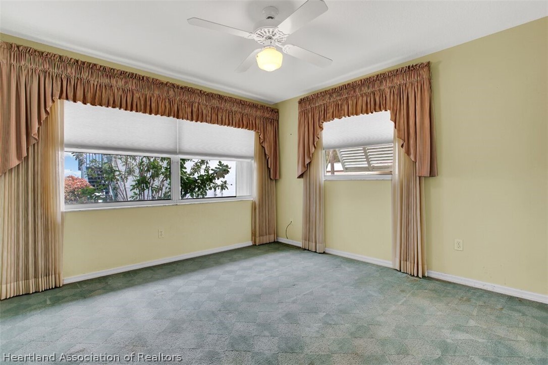 374 Cloverleaf Road Lake Placid, FL 33852 - Photo 11 of 26 an empty room with windows and entrance
