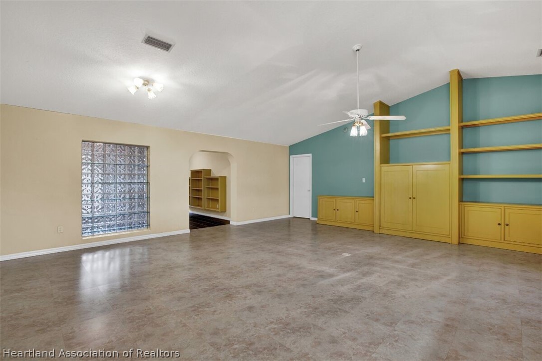 374 Cloverleaf Road Lake Placid, FL 33852 - Photo 6 of 26 an empty room with a empty space and windows