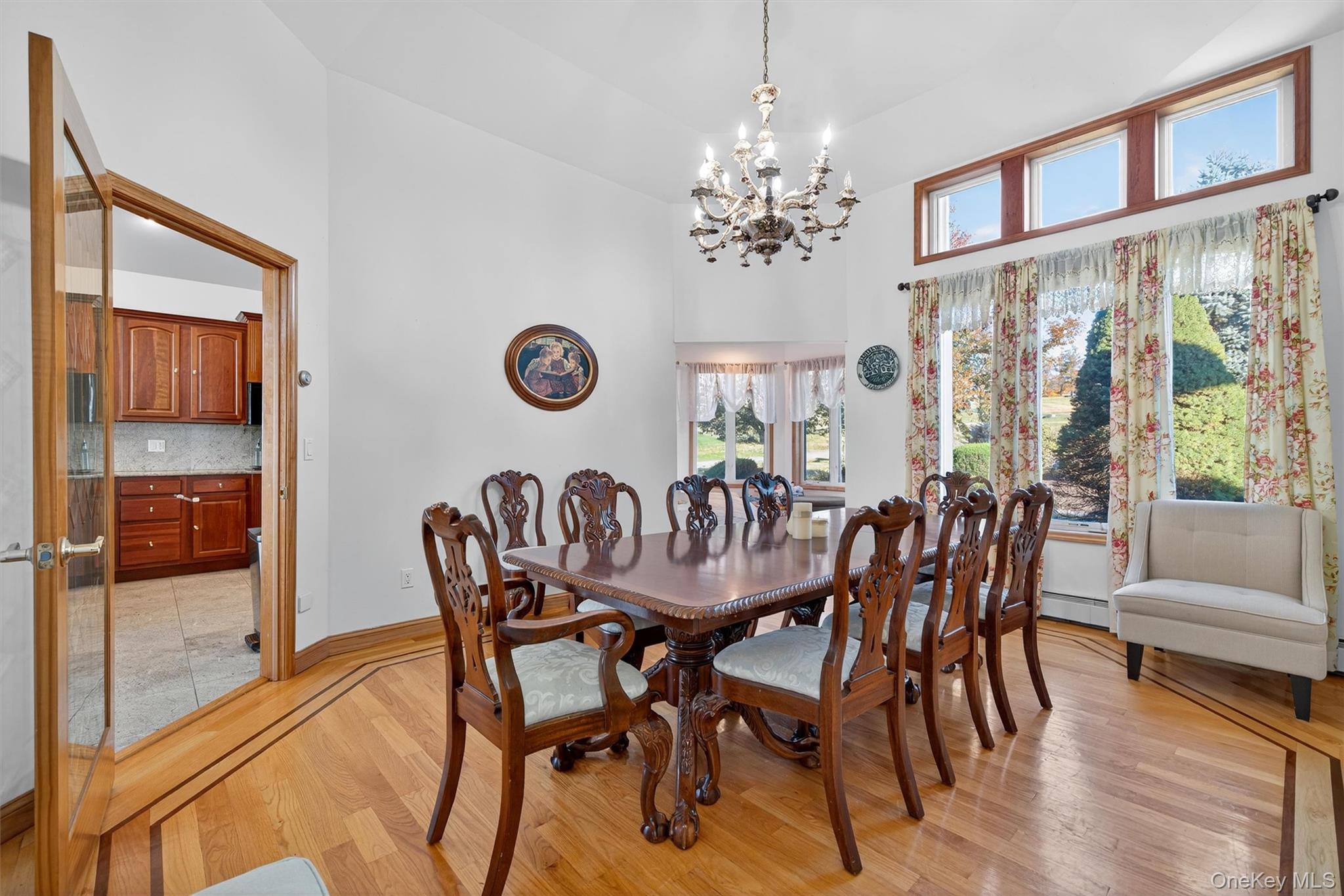 30 Heather Court Middletown, NY 10941 - Photo 15 of 50 a view of a dining room with furniture wooden floor and chandelier