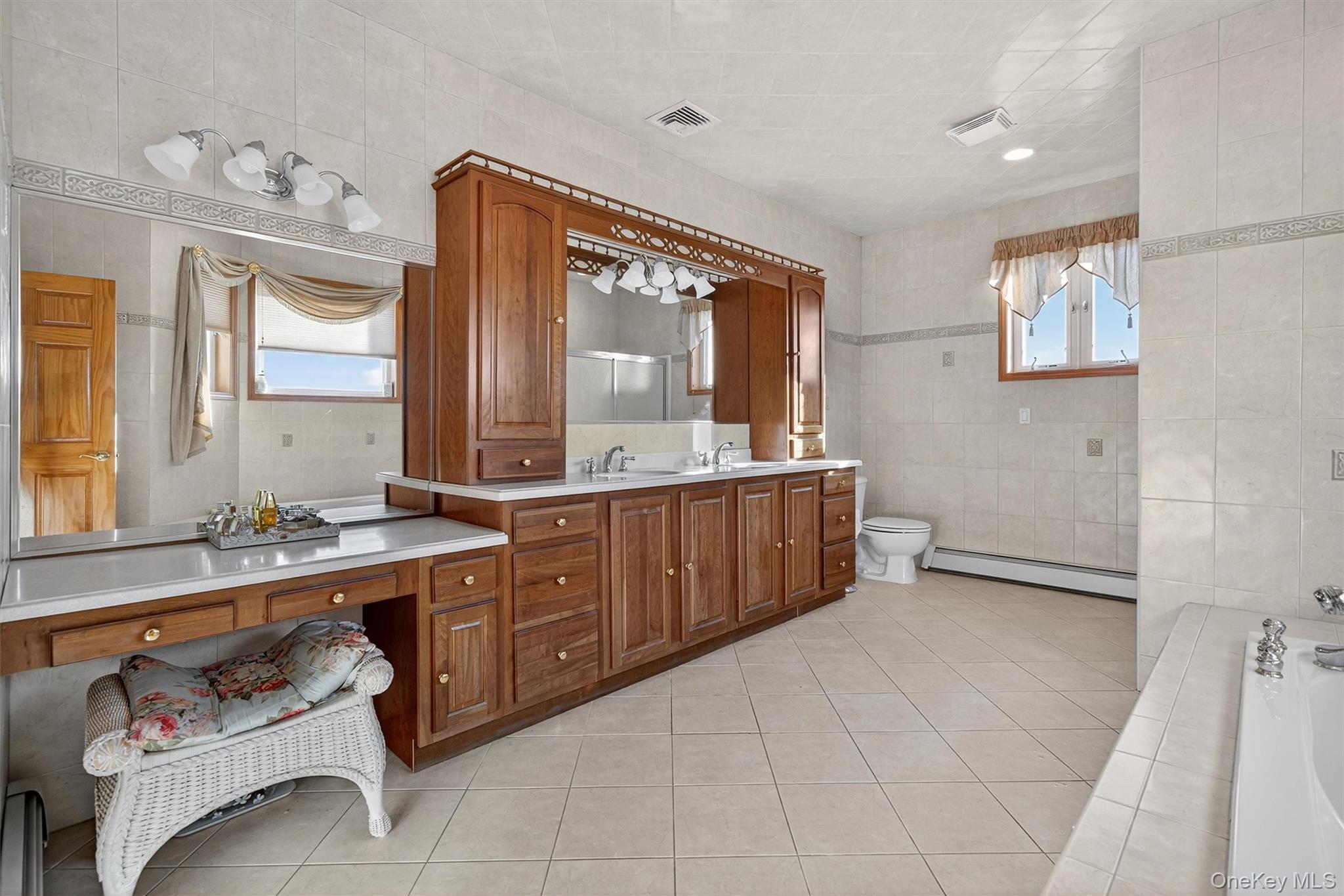 30 Heather Court Middletown, NY 10941 - Photo 18 of 50 a spacious bathroom with a double vanity sink mirror and