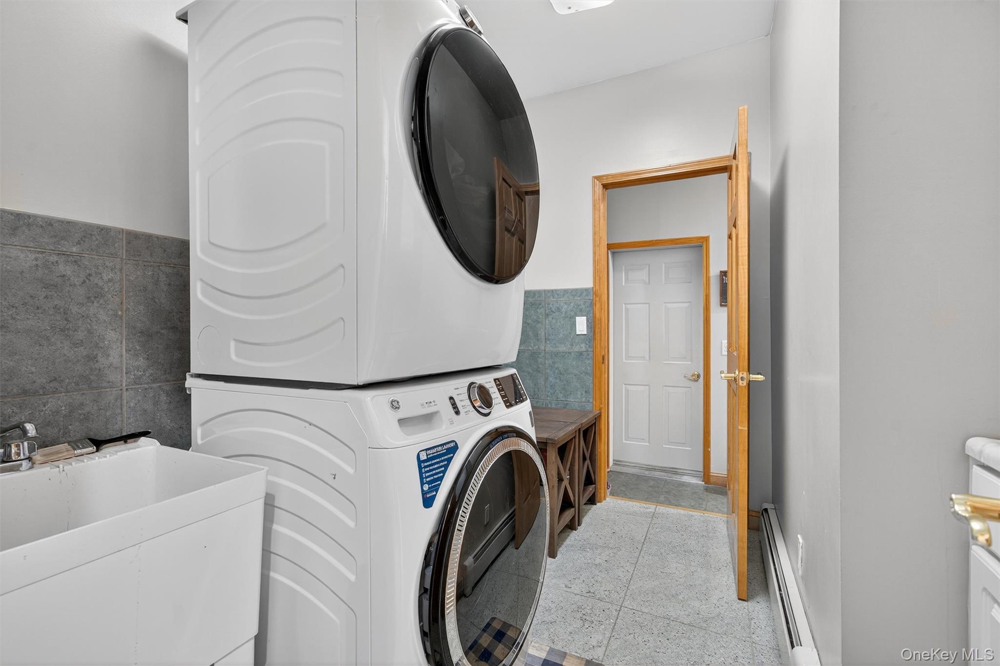 30 Heather Court Middletown, NY 10941 - Photo 24 of 50 a utility room with dryer and washer