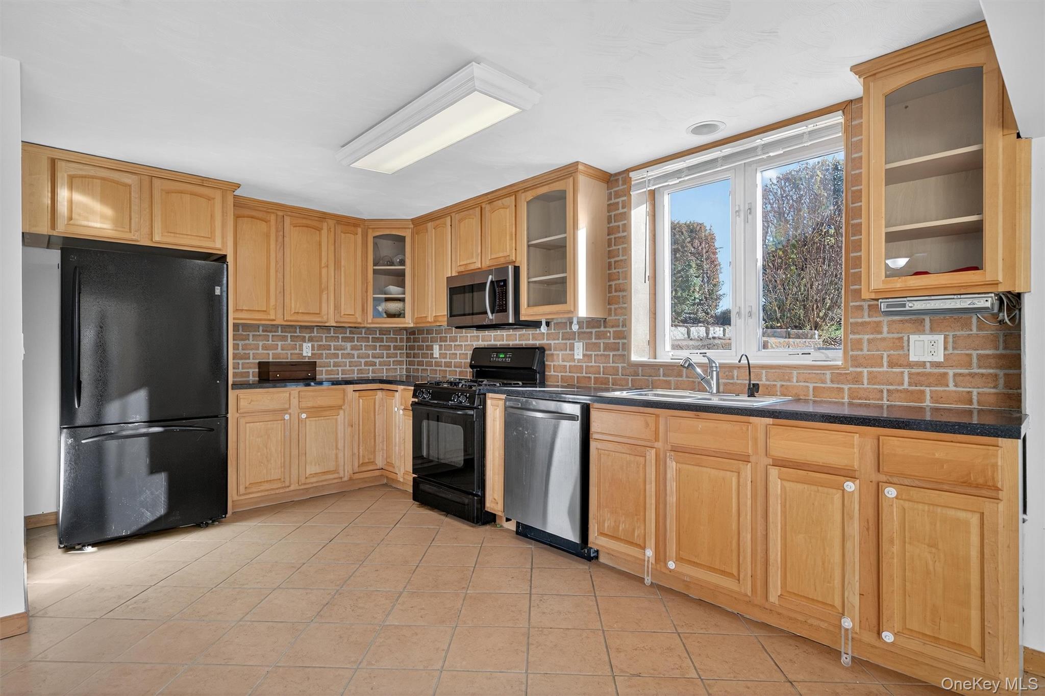 30 Heather Court Middletown, NY 10941 - Photo 27 of 50 a kitchen with stainless steel appliances granite countertop a refrigerator stove top oven and sink