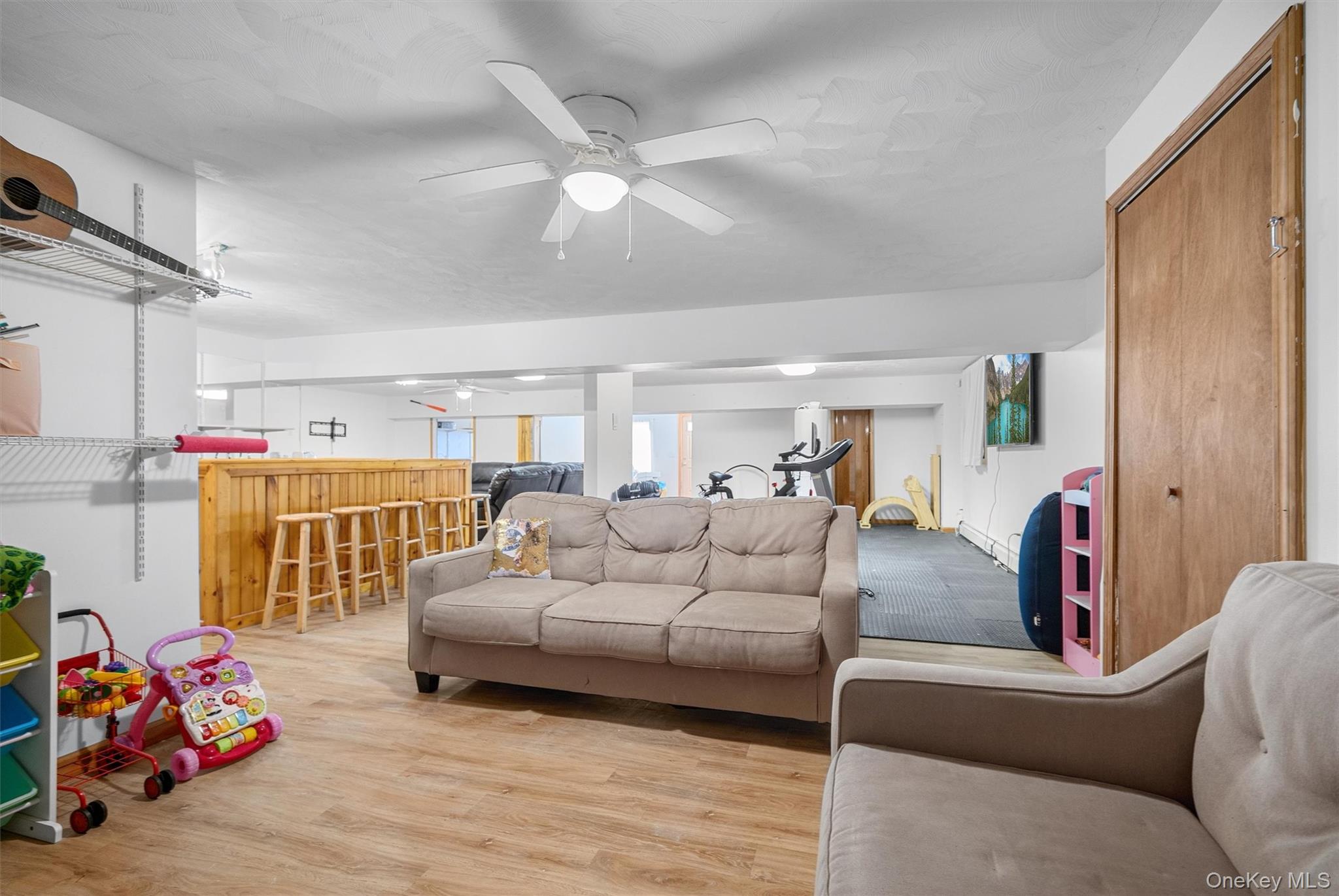 30 Heather Court Middletown, NY 10941 - Photo 35 of 50 a living room with furniture and a chandelier