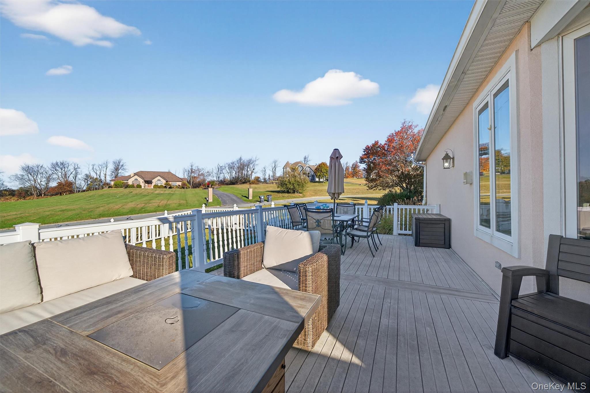 30 Heather Court Middletown, NY 10941 - Photo 38 of 50 a view of a balcony with dining table and chairs