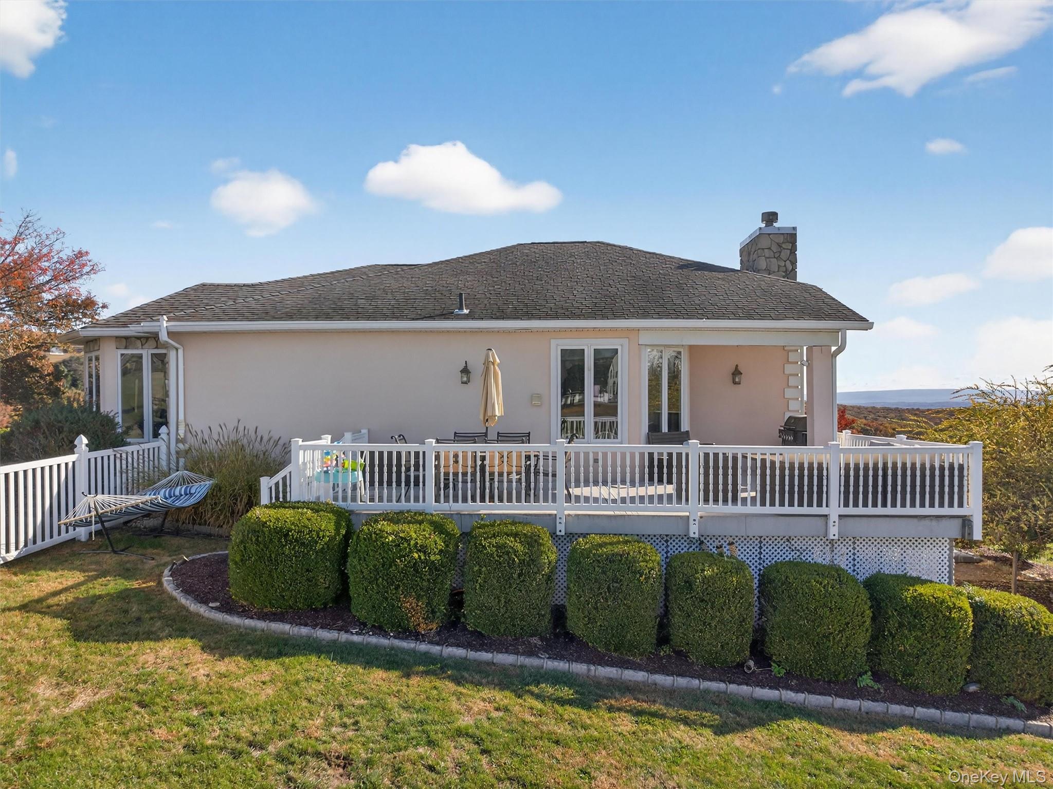 30 Heather Court Middletown, NY 10941 - Photo 41 of 50 a view of a roof deck with couches and pool