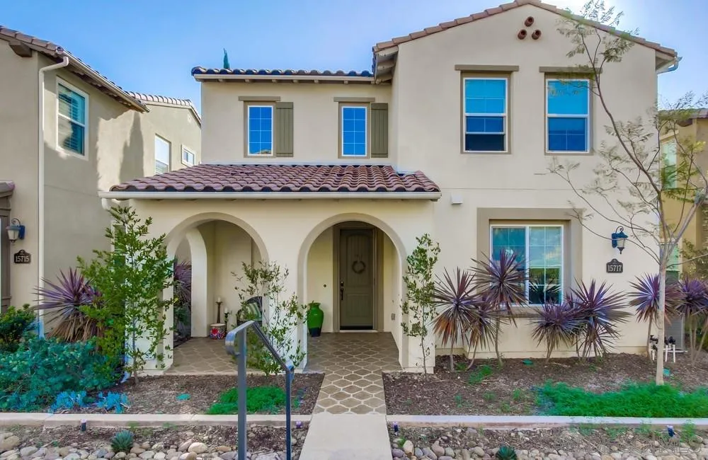 15717 Tanner Ridge Road San Diego, CA 92127 - Photo 1 of 24 a front view of a house with garden