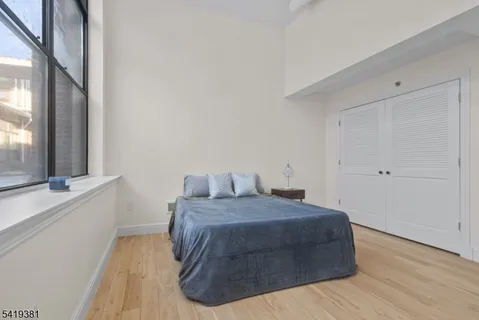 a workspace with furniture and a window