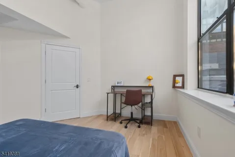 a bathroom with a toilet sink and shower