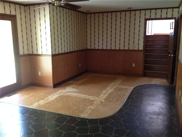 651 Big Spring Hollow Road Pulaski, TN 38478 - Photo 5 of 10 an empty room with windows