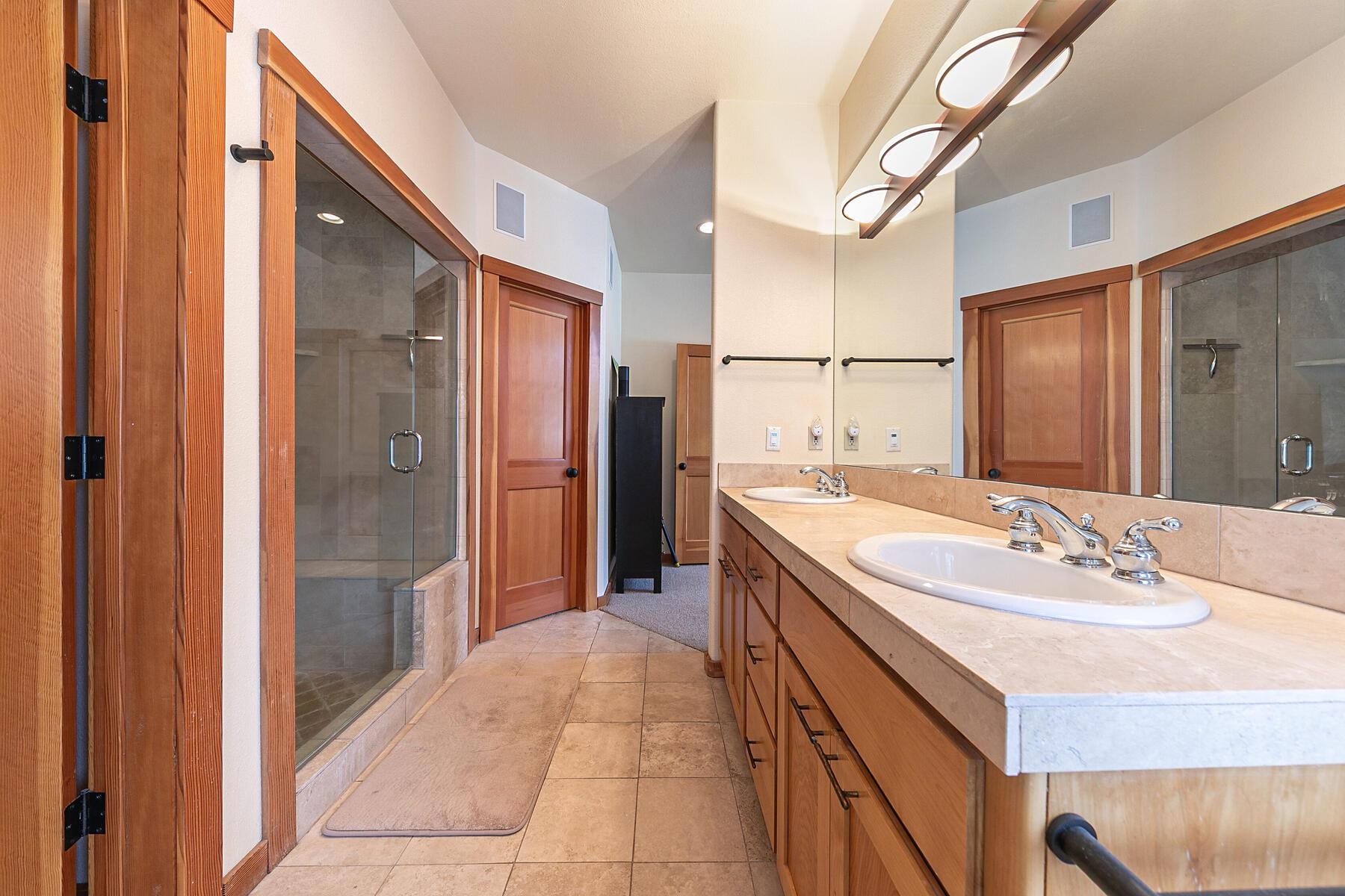 1018 Snow Crest Road Alpine Meadows, CA 96146 - Photo 18 of 28 a bathroom with a sink a mirror and a shower