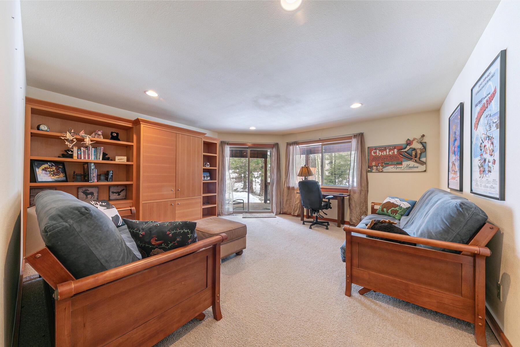 1018 Snow Crest Road Alpine Meadows, CA 96146 - Photo 19 of 28 a living room with furniture and a large window