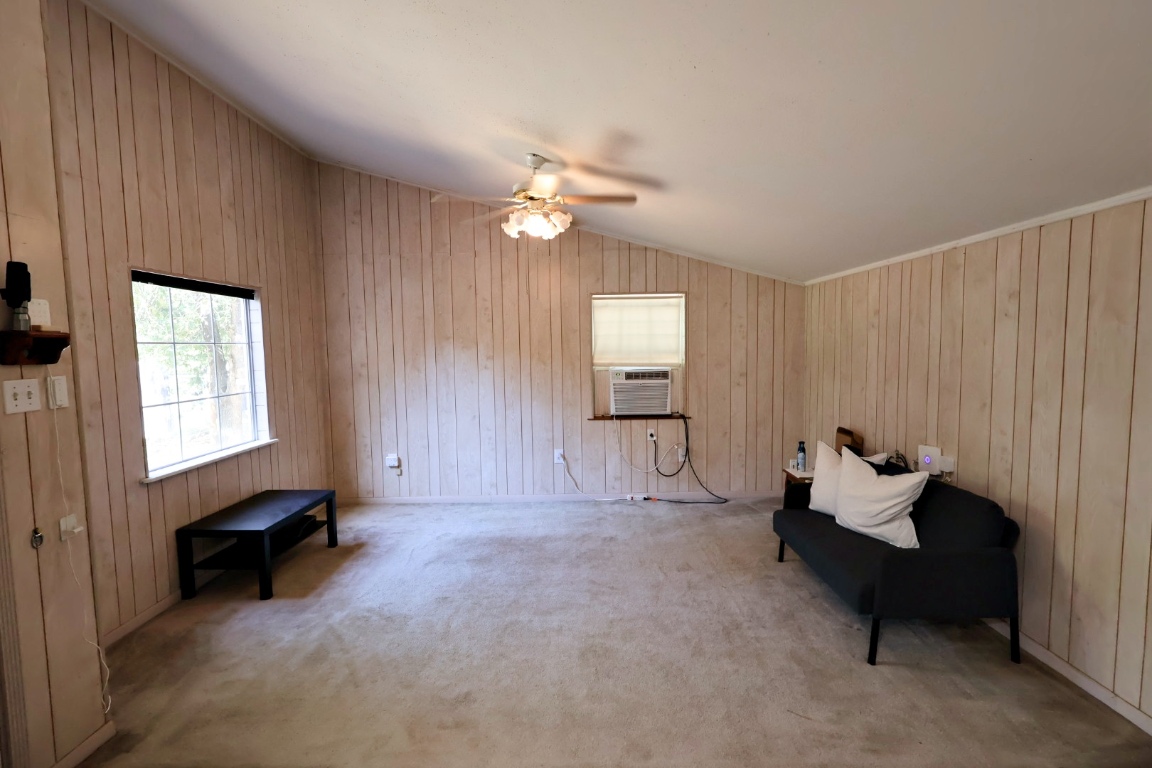 109 Travis Road Paige, TX 78659 - Photo 14 of 39 a living room with furniture and a window