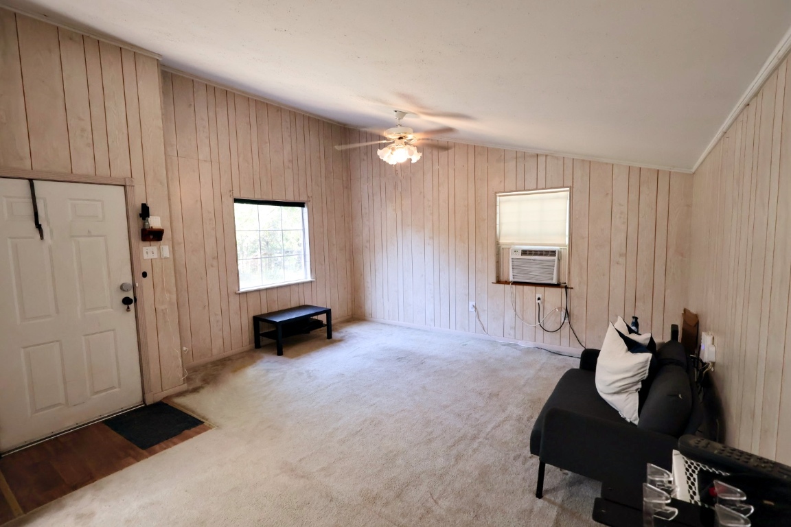 109 Travis Road Paige, TX 78659 - Photo 35 of 39 a big room with windows and closet