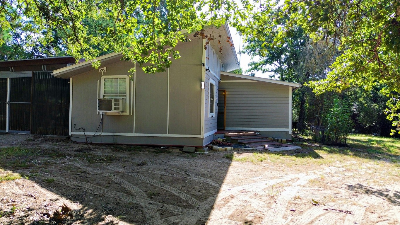 109 Travis Road Paige, TX 78659 - Photo 39 of 39 a view of a house with a yard
