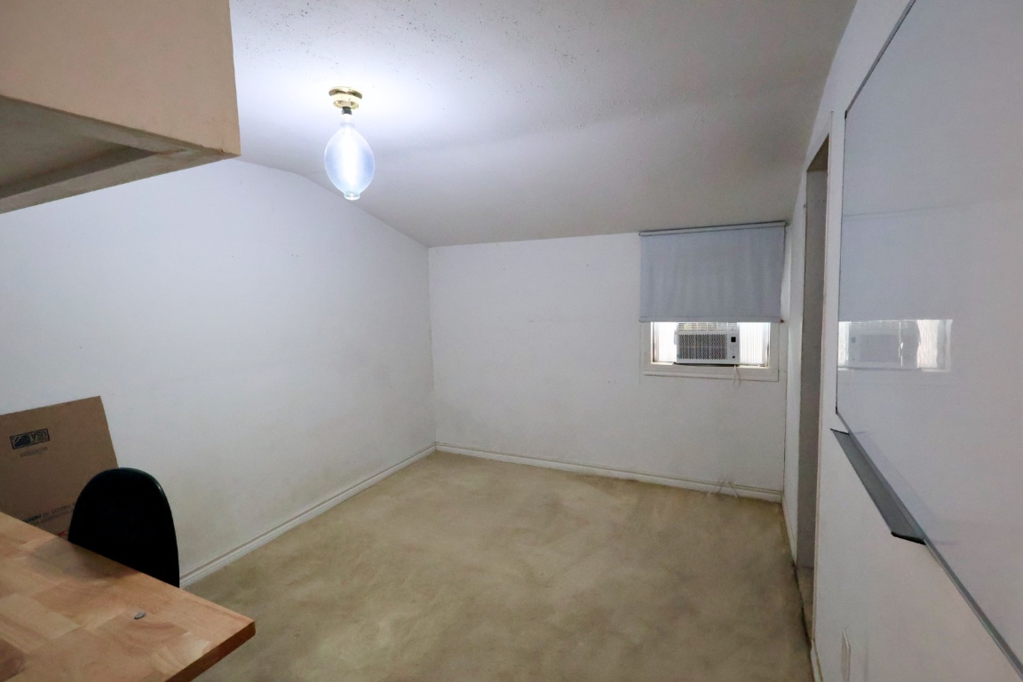 109 Travis Road Paige, TX 78659 - Photo 5 of 39 a view of a livingroom and a window