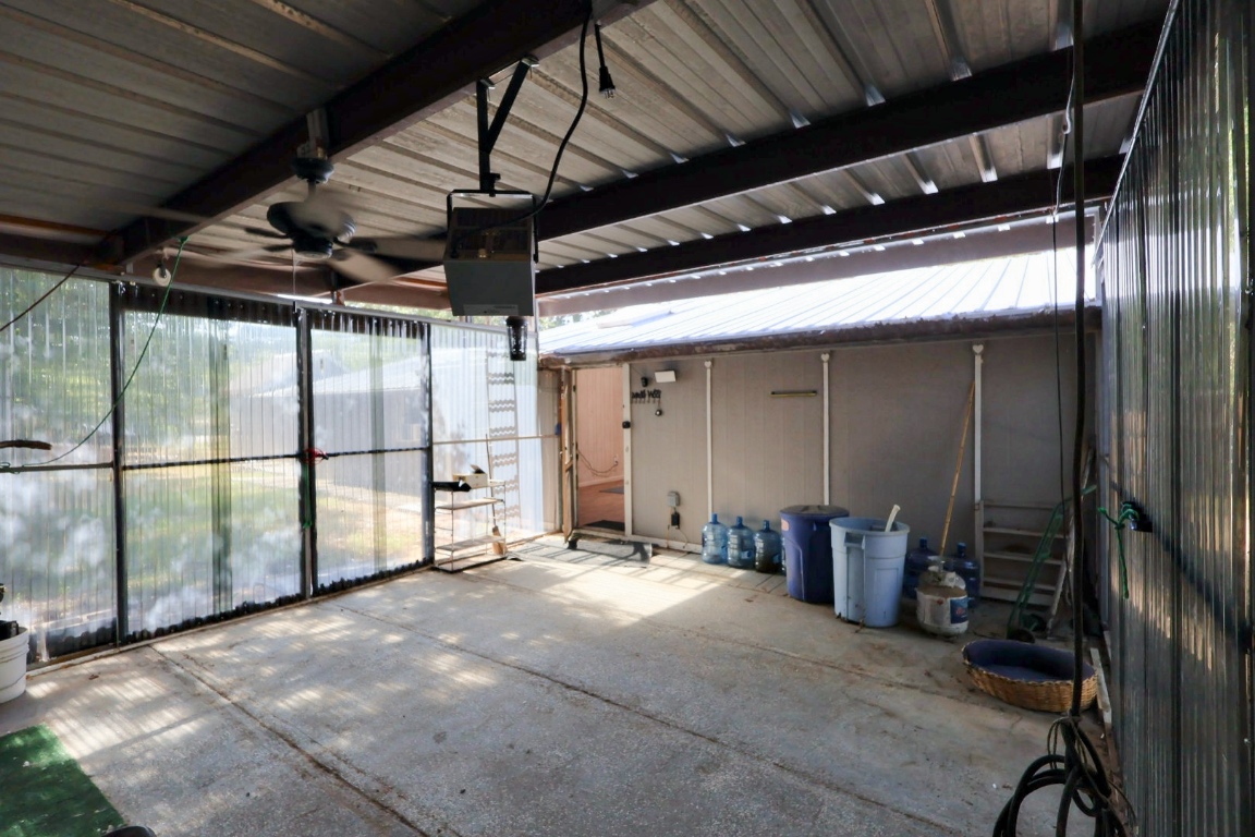 109 Travis Road Paige, TX 78659 - Photo 8 of 39 a view of empty room with wooden floor