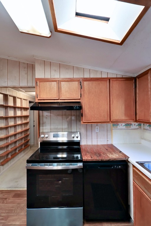 109 Travis Road Paige, TX 78659 - Photo 10 of 39 a kitchen with a stove and a sink