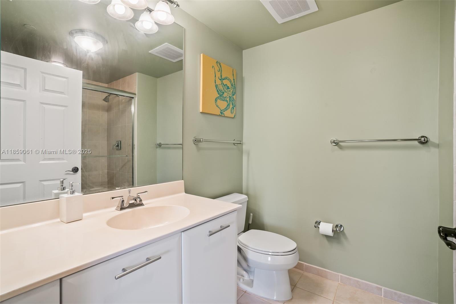 510 Northwest 84th Avenue, Unit 445 Plantation, FL 33324 - Photo 23 of 42 a bathroom with a sink and a toilet