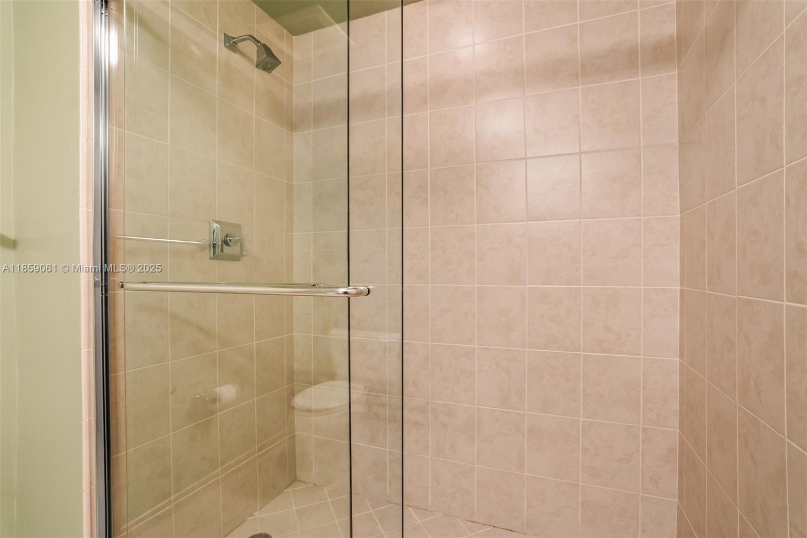 510 Northwest 84th Avenue, Unit 445 Plantation, FL 33324 - Photo 24 of 42 a bathroom with a shower