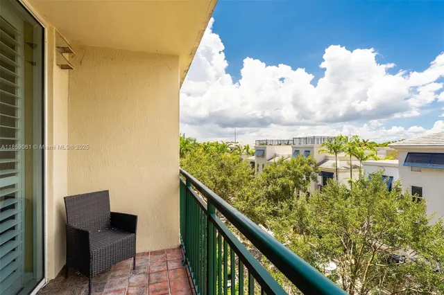 a view of swimming pool from a balcony