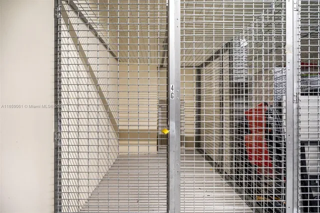 a view of swimming pool with outdoor seating and house in the background