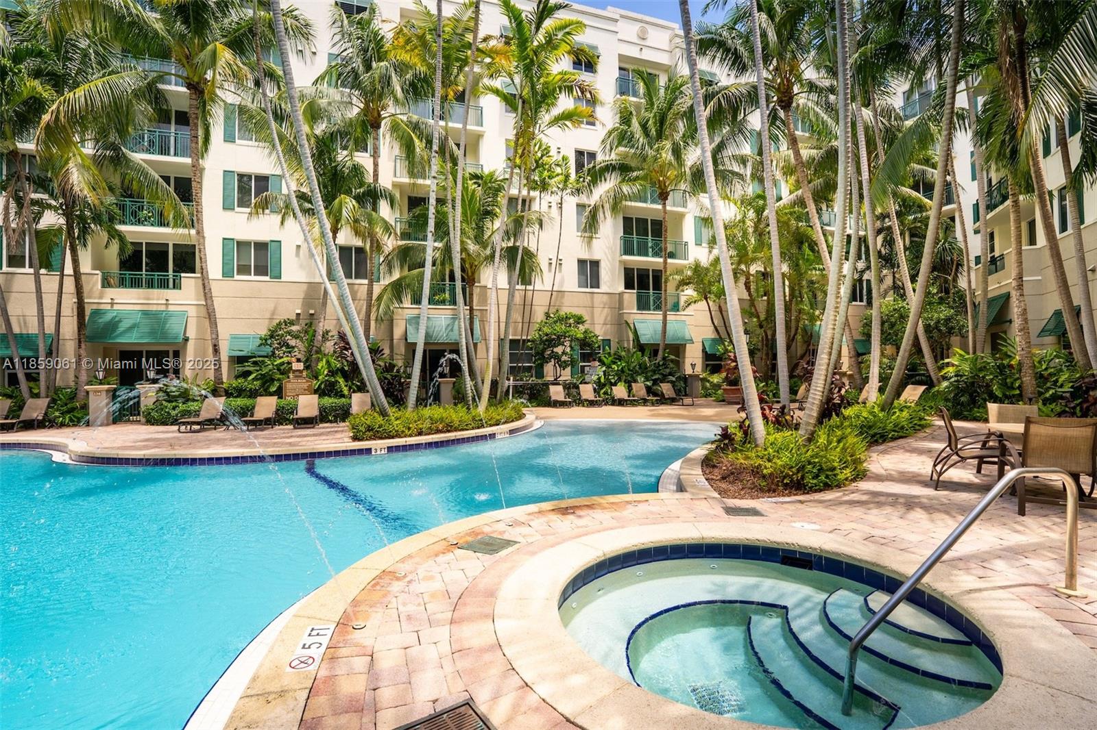510 Northwest 84th Avenue, Unit 445 Plantation, FL 33324 - Photo 36 of 42 a view of swimming pool with outdoor seating and house in the background