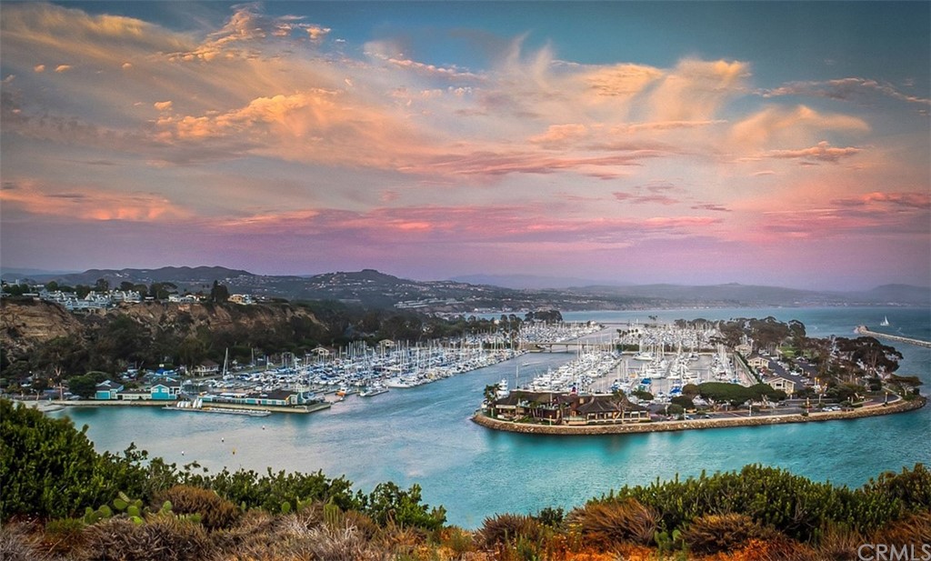 5 Regatta Way Dana Point, CA 92629 - Photo 2 of 36 a view of a lake with houses