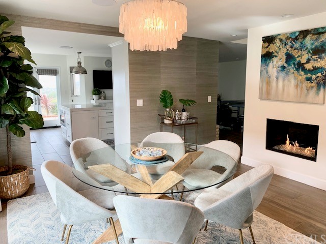 5 Regatta Way Dana Point, CA 92629 - Photo 14 of 36 a dining room with furniture and wooden floor