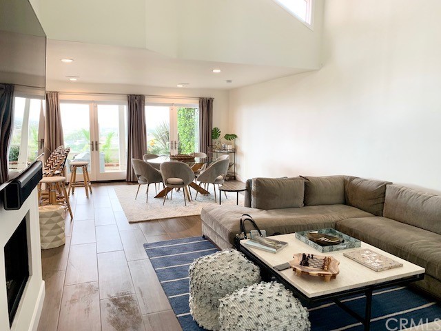 5 Regatta Way Dana Point, CA 92629 - Photo 17 of 36 a living room with furniture and a flat screen tv