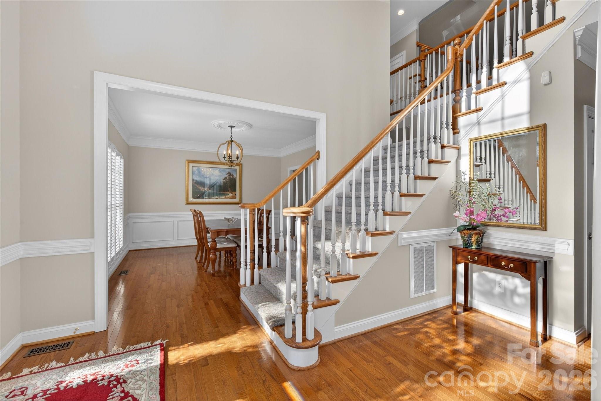 1237 Waynewood Drive Waxhaw, NC 28173 - Photo 2 of 32 a view of entryway and hall with wooden floor
