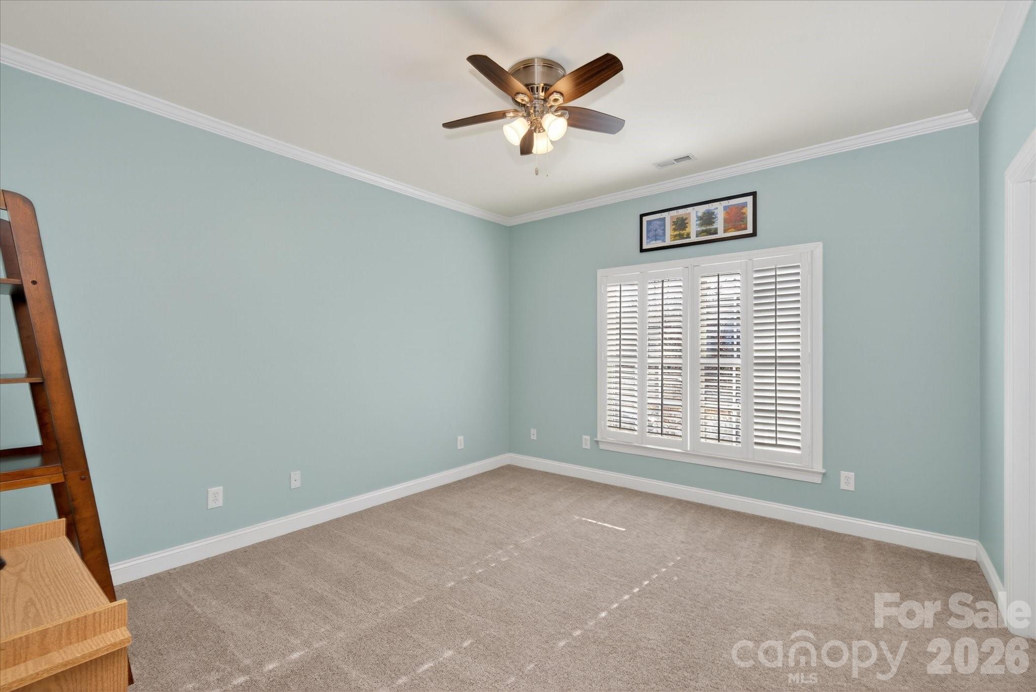 1237 Waynewood Drive Waxhaw, NC 28173 - Photo 23 of 32 a view of an empty room with a window