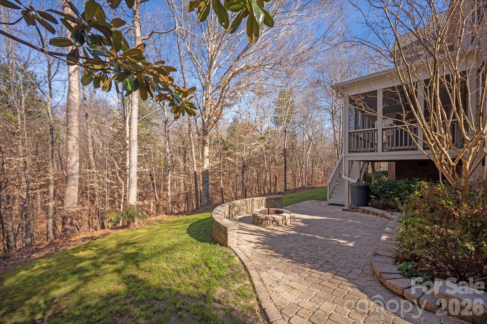 1237 Waynewood Drive Waxhaw, NC 28173 - Photo 28 of 32 a pathway of a house with a yard