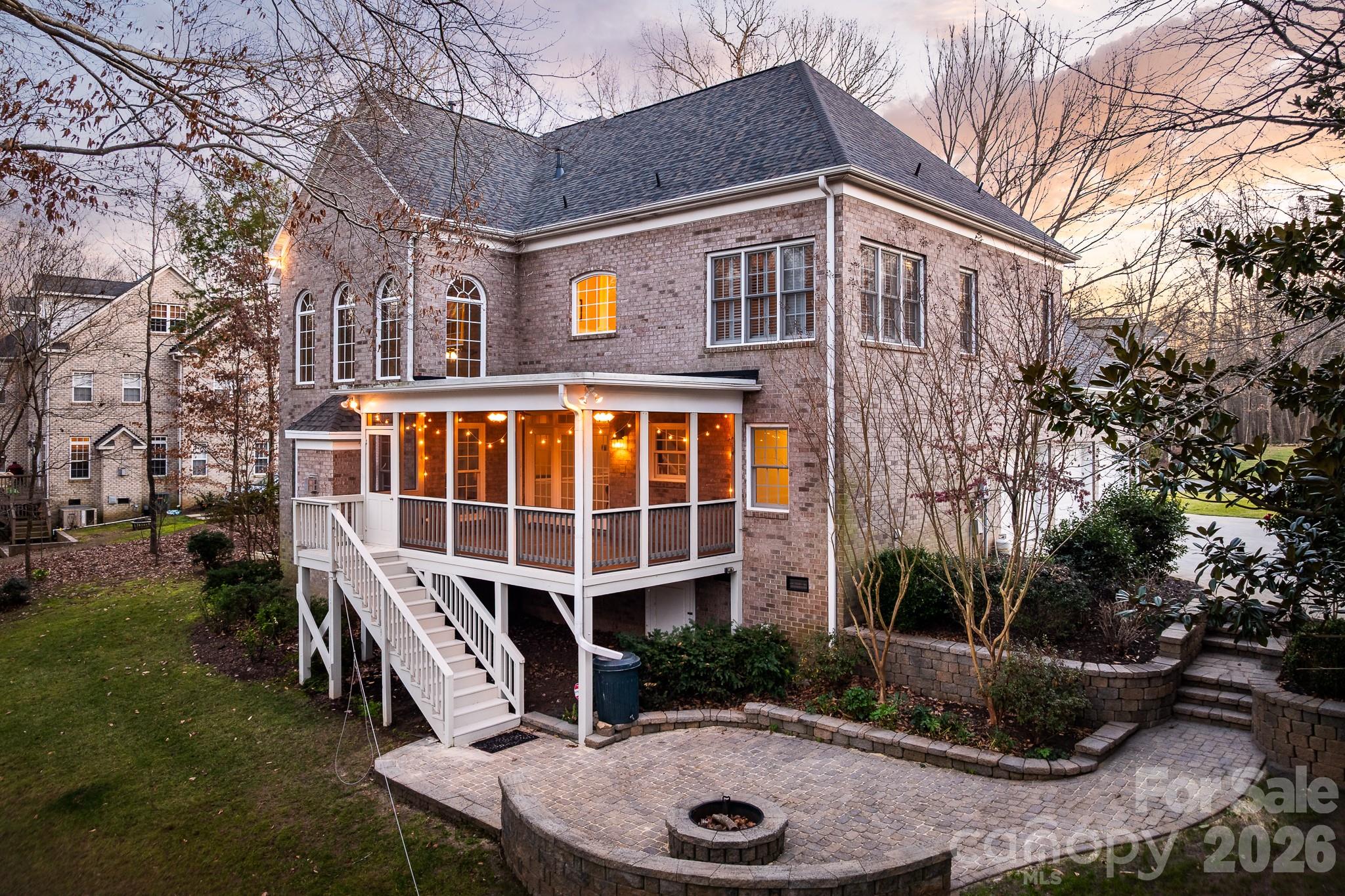 1237 Waynewood Drive Waxhaw, NC 28173 - Photo 30 of 32 a front view of a house with garden