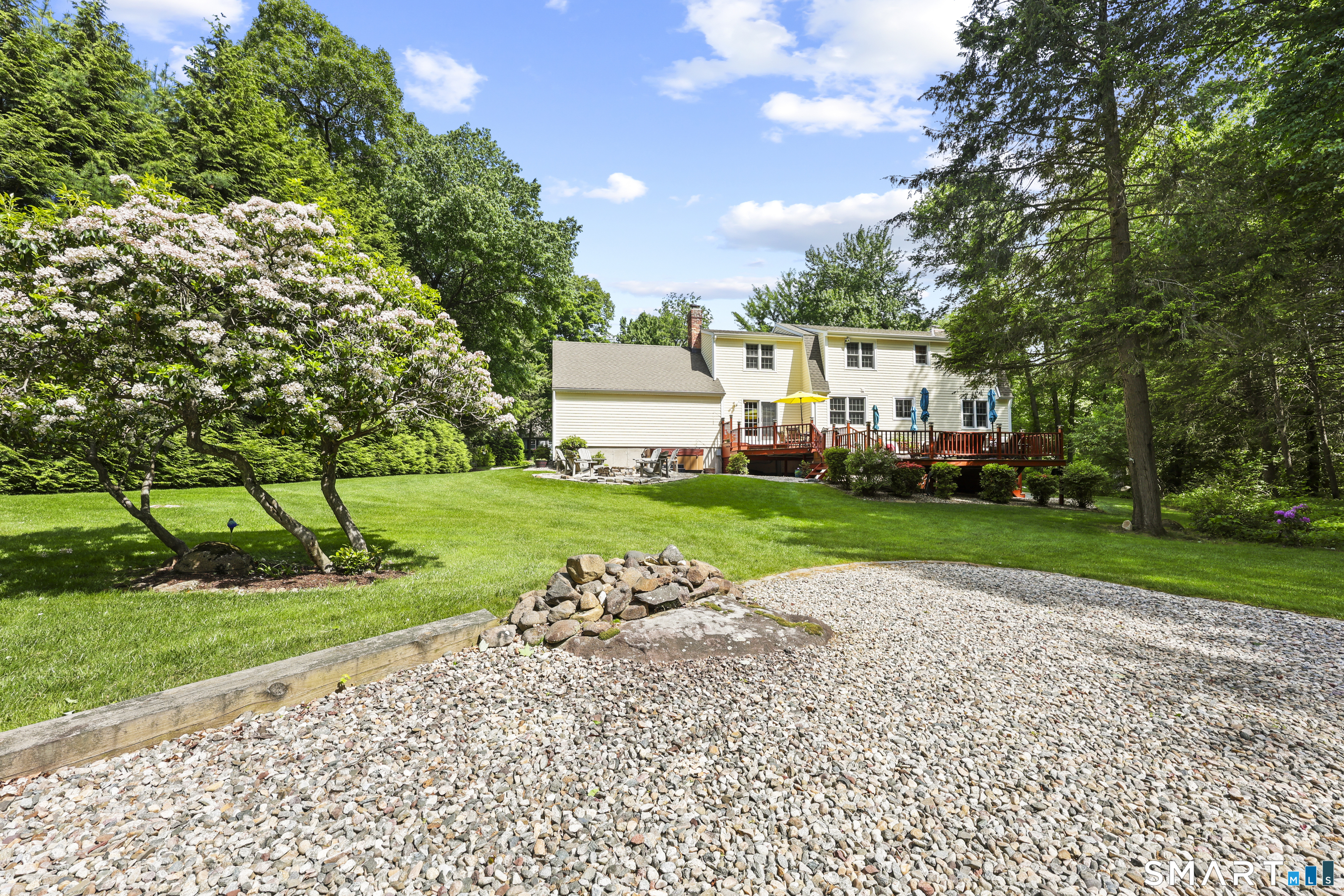 17 Briar Hill Road Avon, CT 06001 - Photo 23 of 38 Large backyard that is designed to have lower maintenance for those who like to enjoy relaxing.