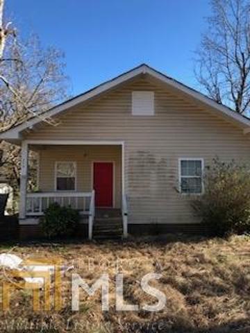 245 East 4th Street Rome, GA 30161 - Photo 1 of 1 front view of a house with a yard