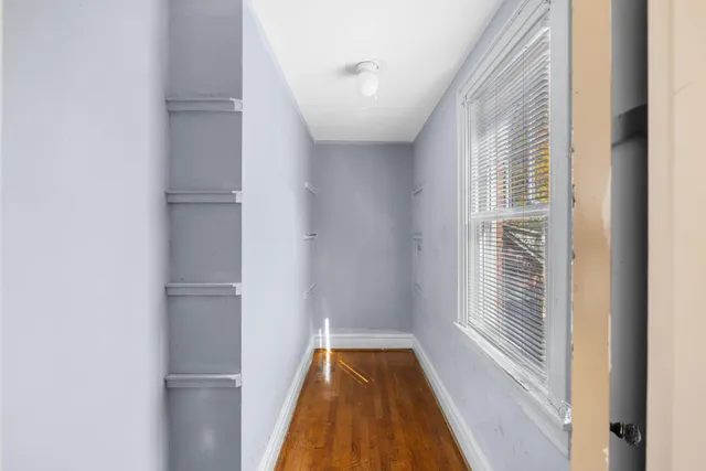a bathroom with a sink toilet and mirror