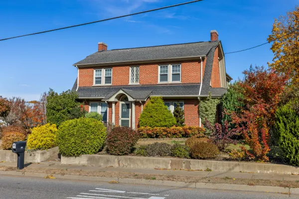 a view of a livingroom with furniture and a flat screen tv