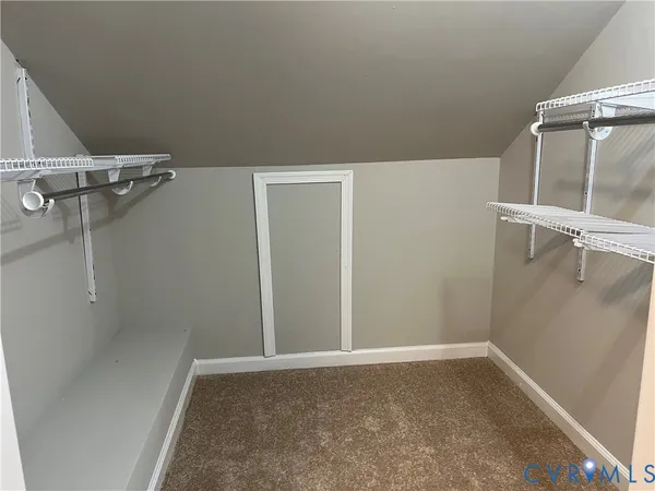 a view of a room with racks on the wall