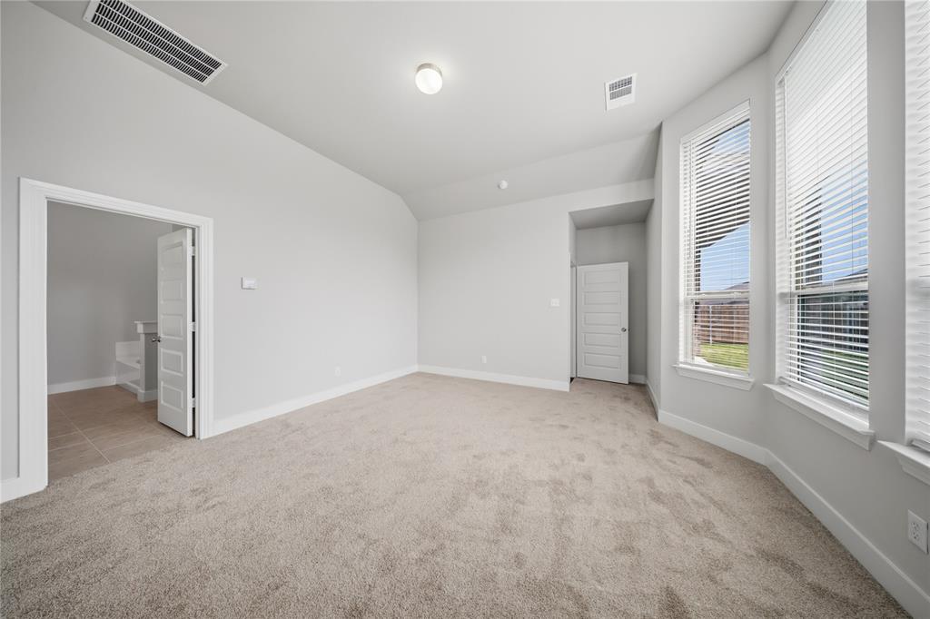 1665 Sheldon Drive Forney, TX 75126 - Photo 15 of 35 a view of an empty room with a window
