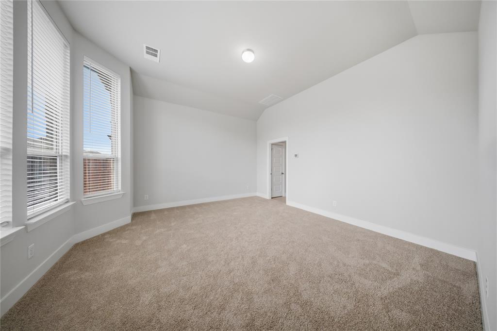 1665 Sheldon Drive Forney, TX 75126 - Photo 16 of 35 an empty room with windows