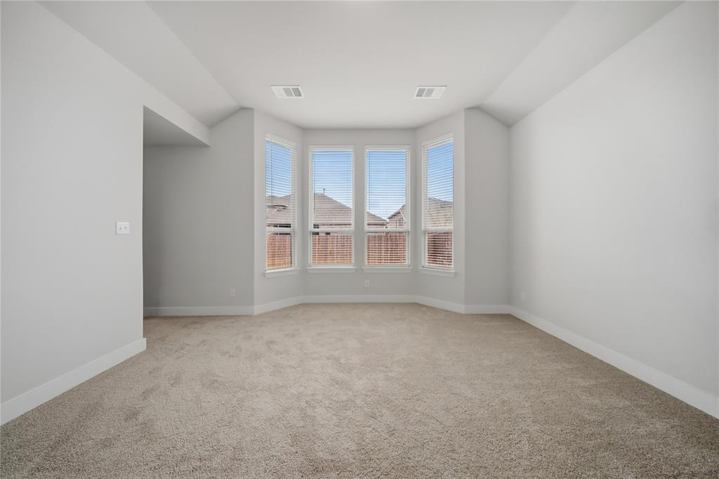 1665 Sheldon Drive Forney, TX 75126 - Photo 17 of 35 a view of an empty room with a window