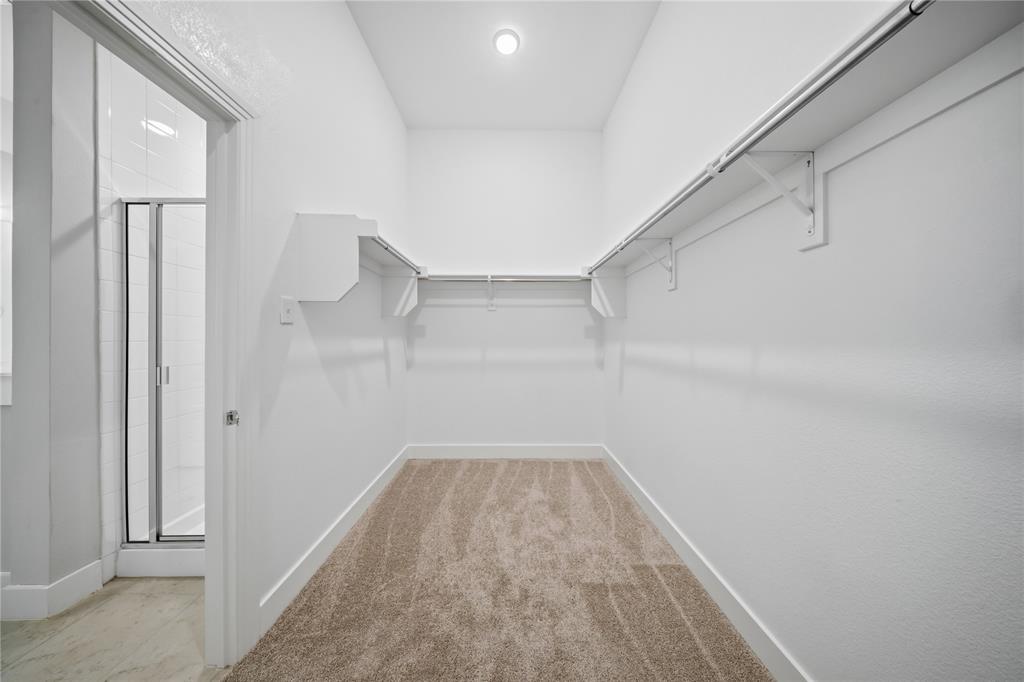 1665 Sheldon Drive Forney, TX 75126 - Photo 20 of 35 a view of a room with wooden floor