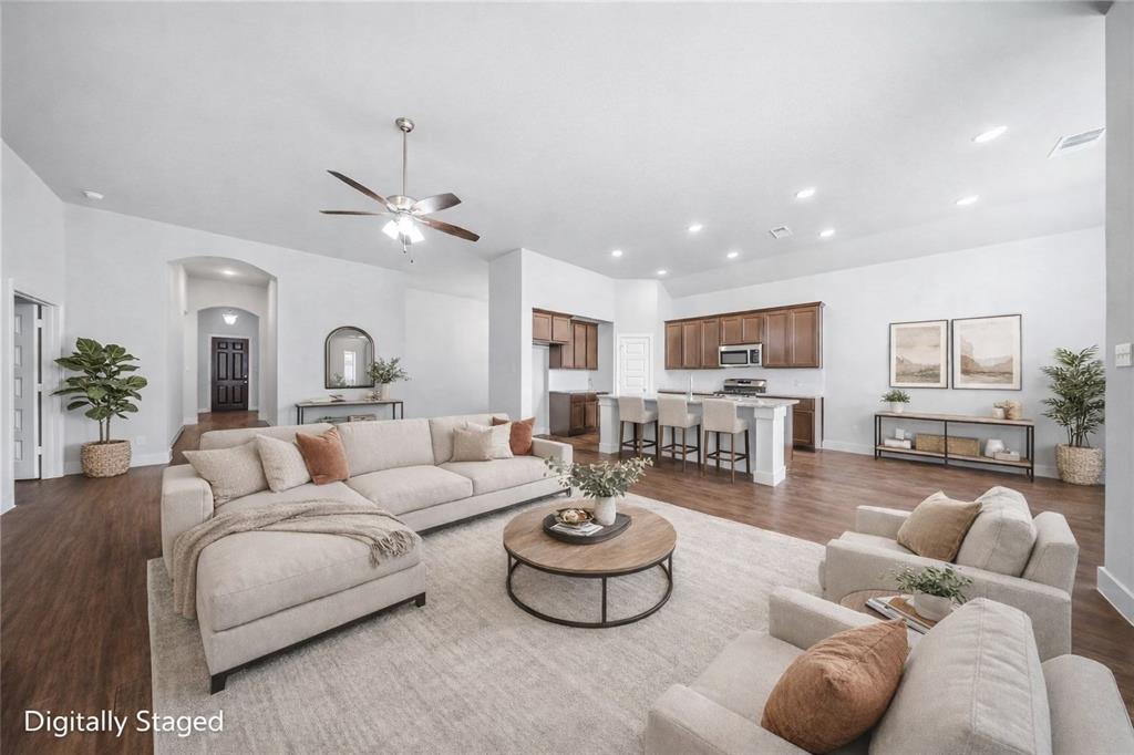 1665 Sheldon Drive Forney, TX 75126 - Photo 2 of 35 a living room with furniture and a large window