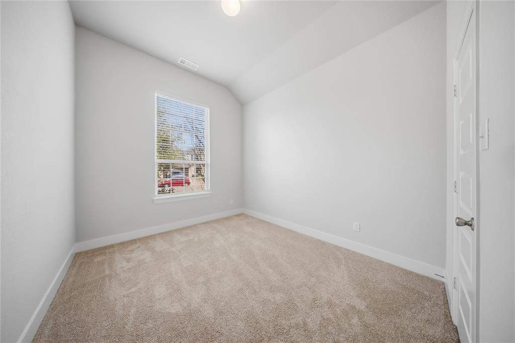 1665 Sheldon Drive Forney, TX 75126 - Photo 26 of 35 an empty room with windows